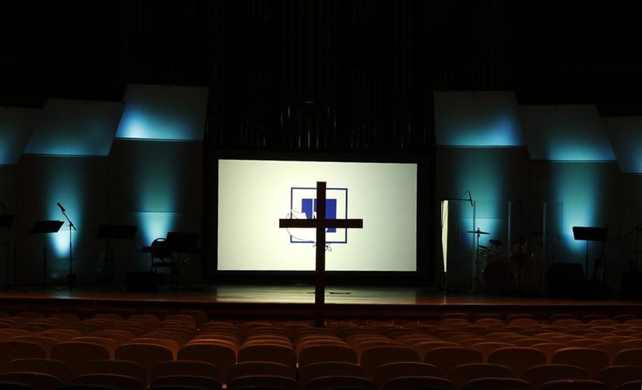 Cross in front of Chapel logo
