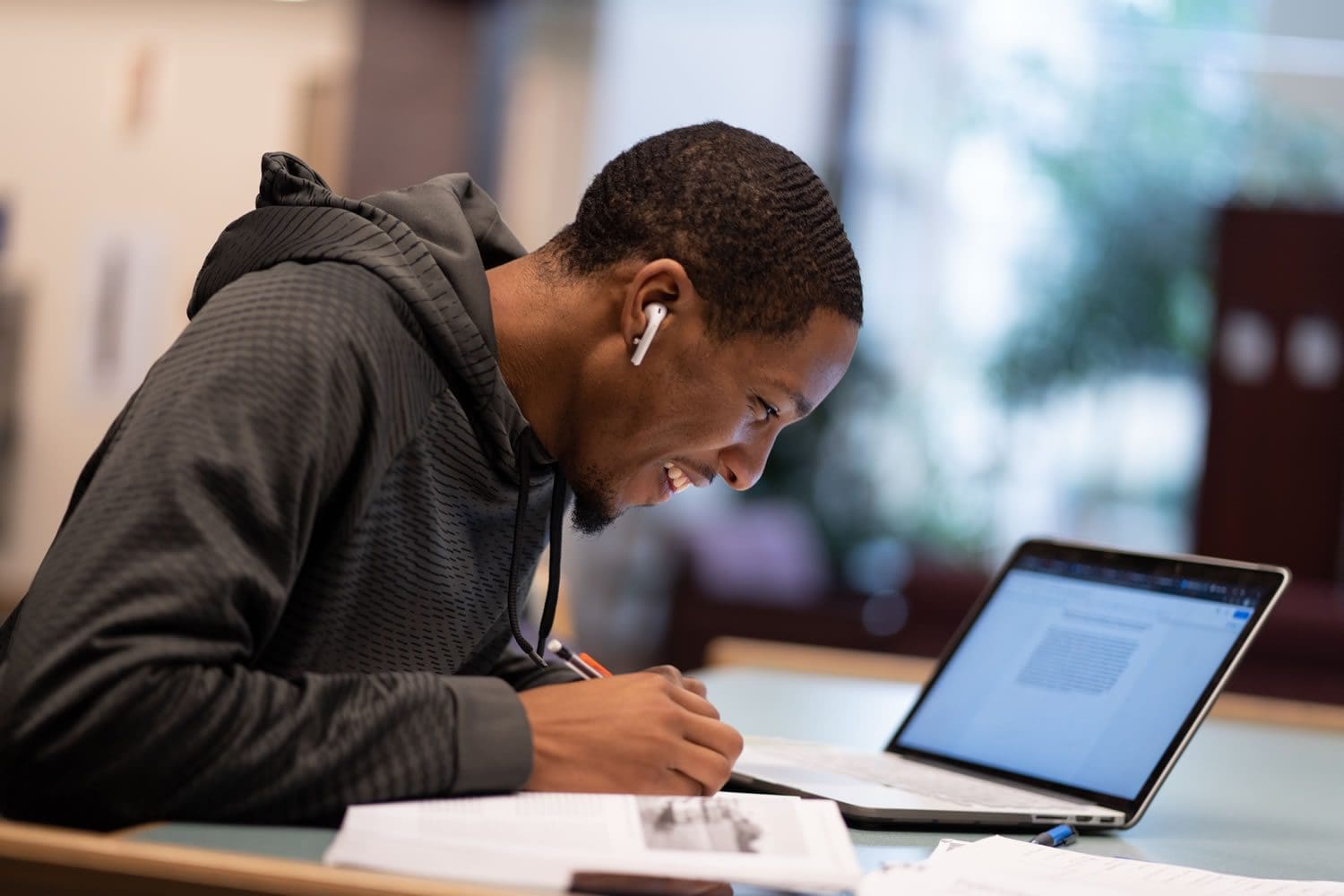 Student studying in library Student studying in library