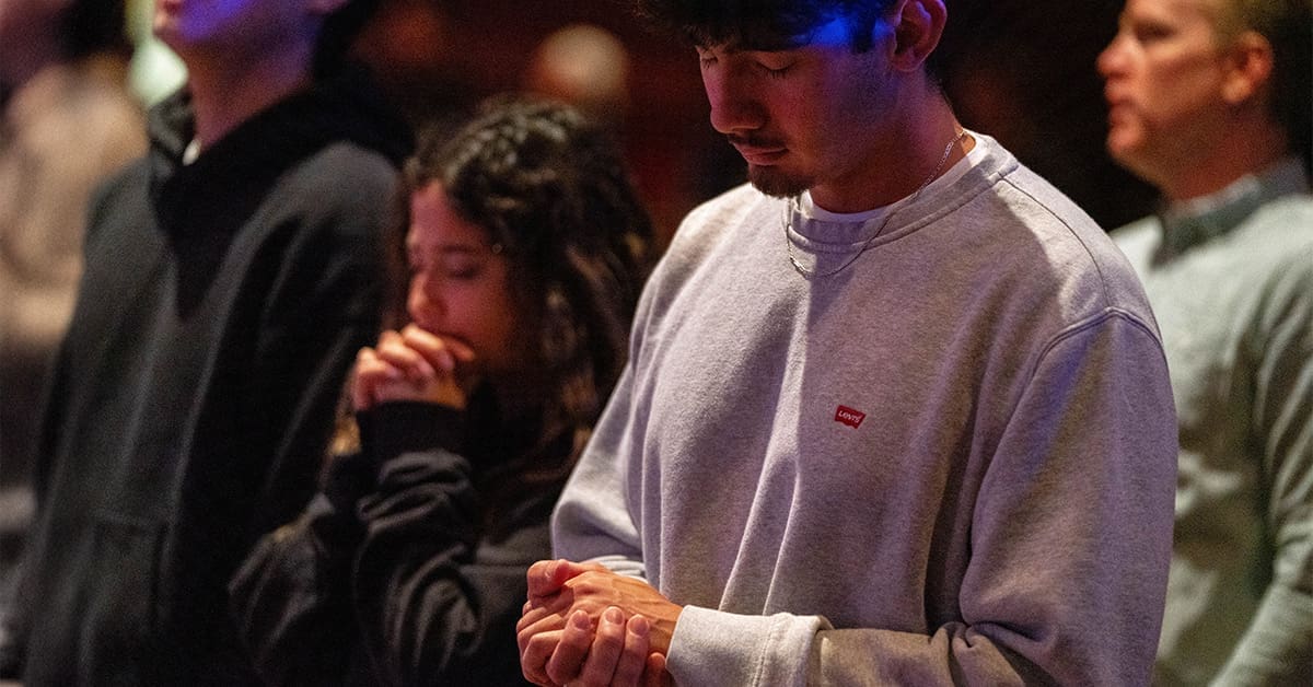 Students praying together