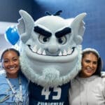 Troll with students at celebration, Trinity Together