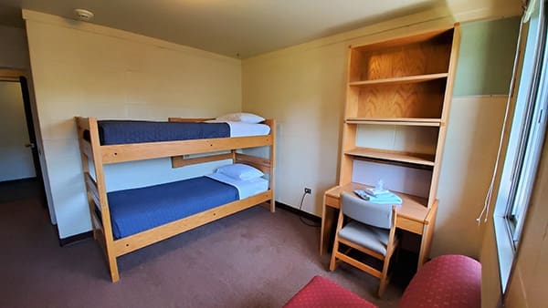 South Hall guest suite with two twin extra-long beds